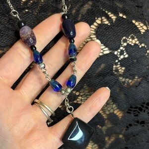 Elegant Blue and Black Glass Necklace
